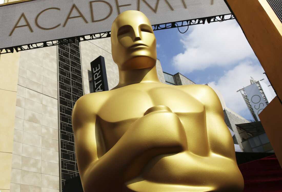 An Oscar statue appears outside the Dolby Theatre ahead of the 2015 ceremony. But who is he really?