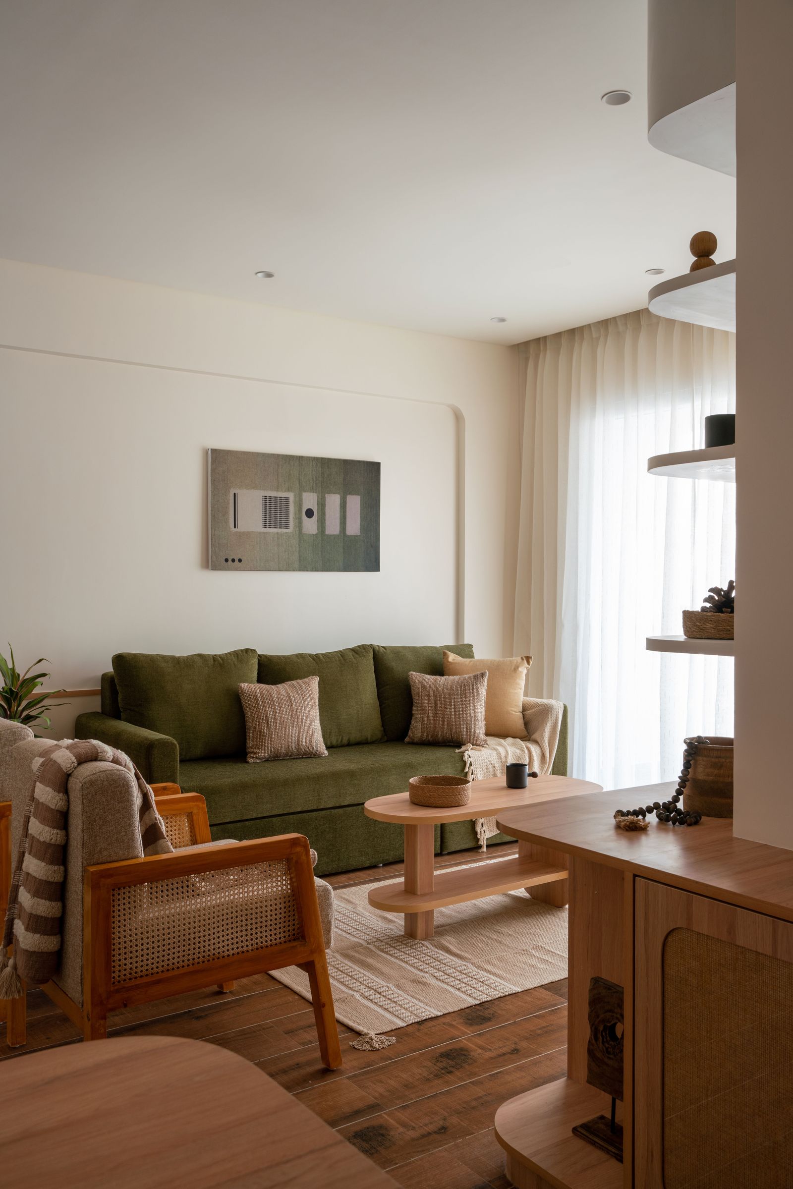 Image may contain Couch Furniture Home Decor Architecture Building Indoors Living Room Room and Cushion