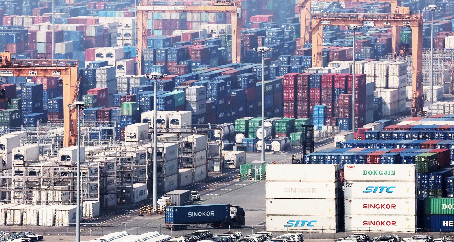 Containers are stacked at a port in Pyeongtaek, Gyeonggi Province, Thursday. Yonhap