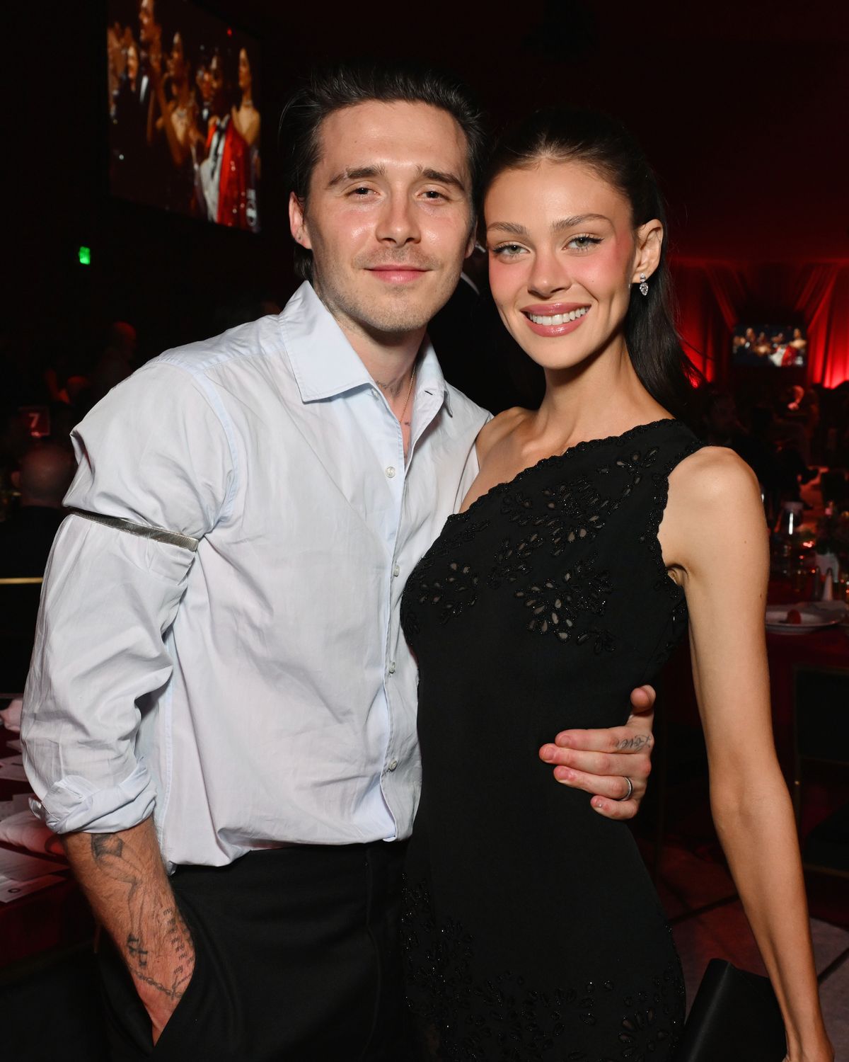 Brooklyn and Nicola attended the party after snubbing Mother's Day