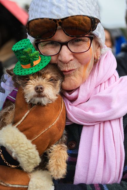 Kay Plunkett with her dog Rosie, enjoying  the St Patrick's Festival Parade, in Killarney town on Tuesday, organised by Killarney Chamber of Tourism and Commerce. Photo by Valerie O'Sullivan. 