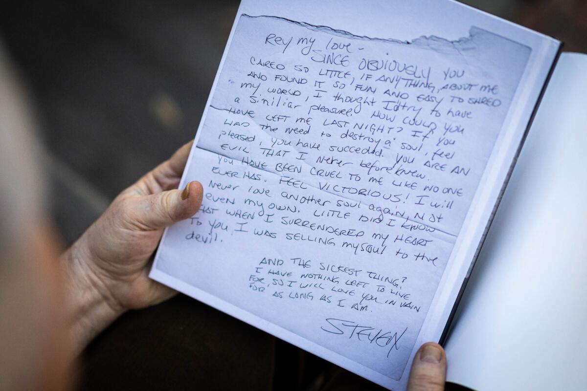 Los Angeles, CA - February 27, 2026: Longstanding queer L.A. photographer Reynaldo Rivera holds his new book Propiedad Privada at his home in Lincoln Heights on Friday, Feb. 27, 2026 in Los Angeles, CA. (Brian Feinzimer / For The Times)