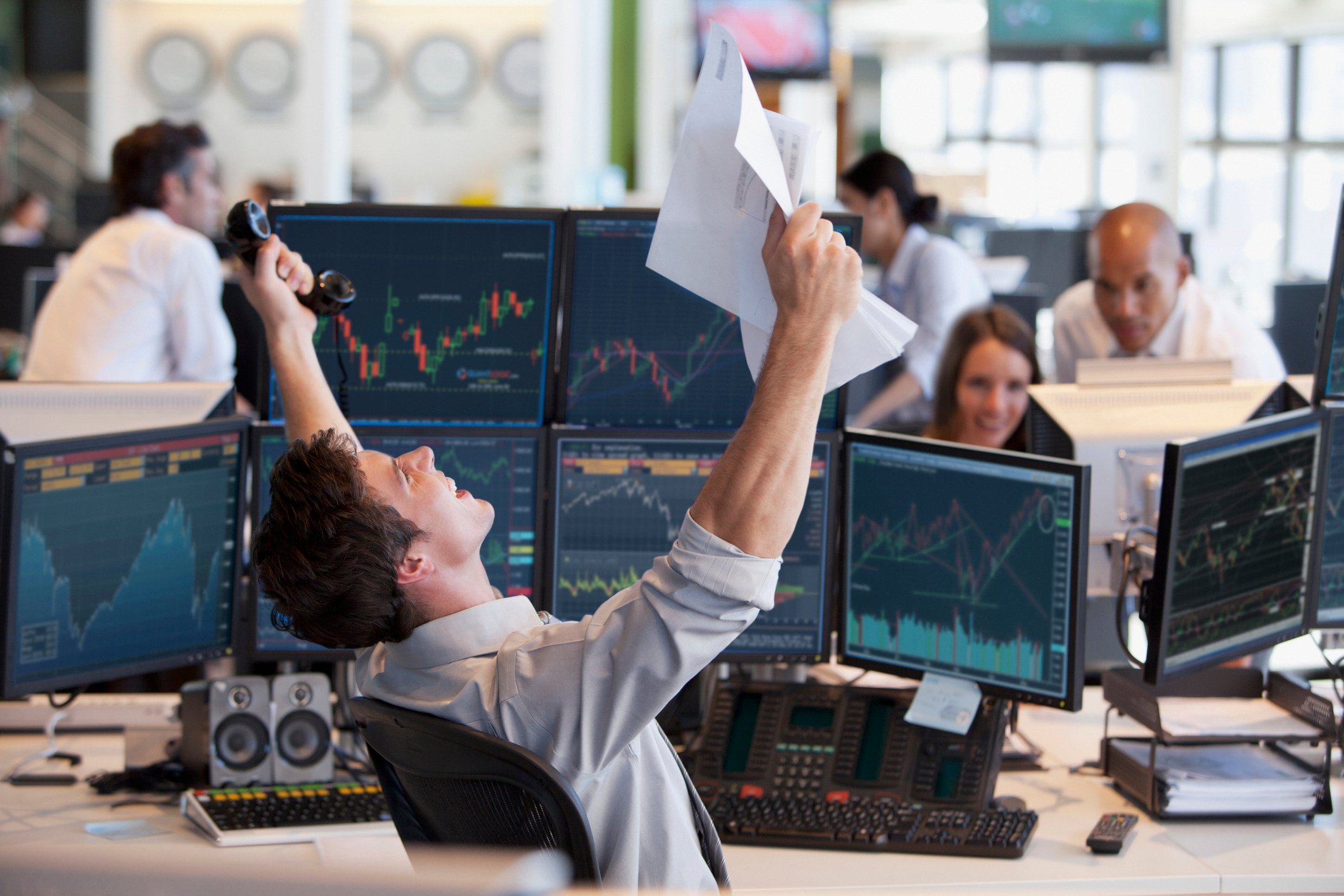 Investor celebrating a huge stock win.