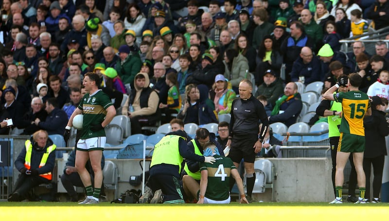 Kerry’s Dylan Casey receives treatment following a tackle from Donegal's Michael Murphy. Photograph: James Crombie/Inpho