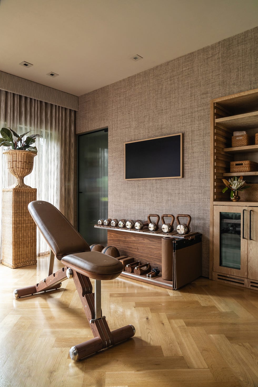 home gym featuring various workout equipment