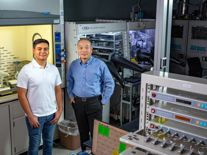 Kevin Velasquez (left) and Henry Meng in the Meng Nano and Energy Lab.