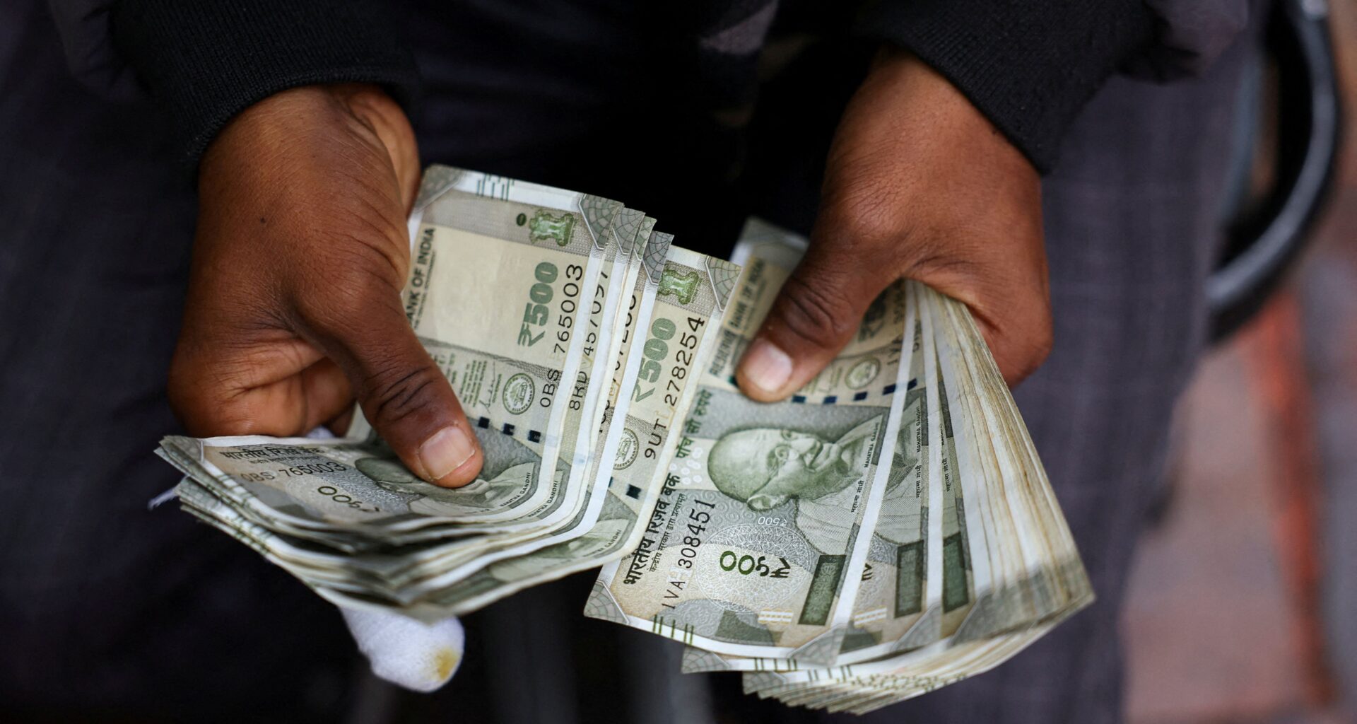 Indian rupee weakens in NDF, set to slide past 93 as oil surges