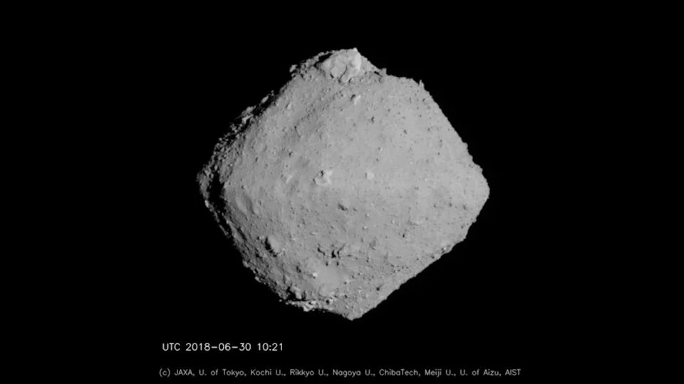 A photo of asteroid Ryugu in space. .
