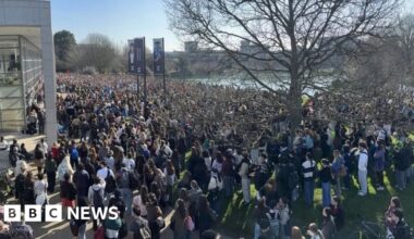 Thousands of students rally after woman's explicit images circulated - BBC