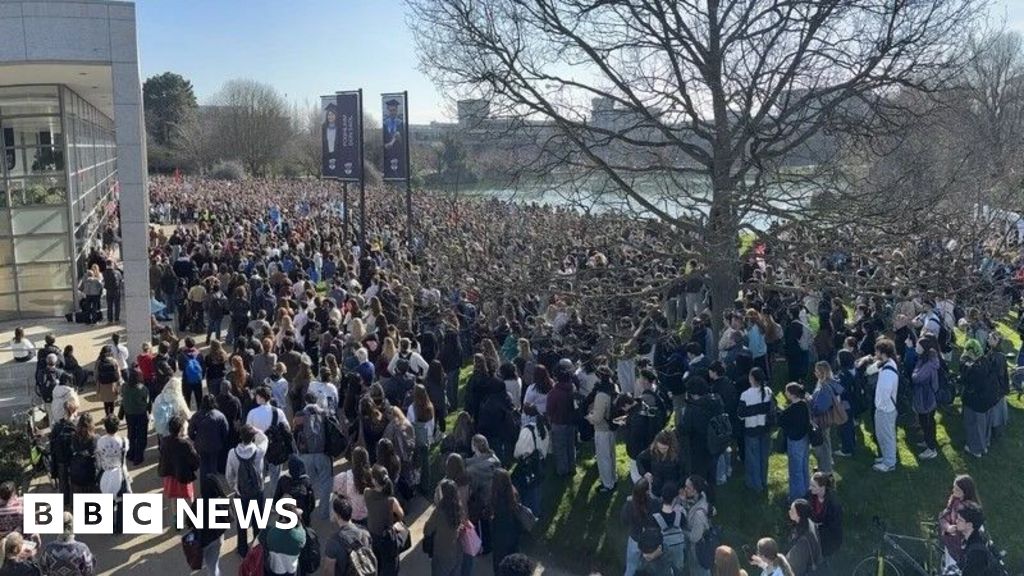 Thousands of students rally after woman's explicit images circulated - BBC