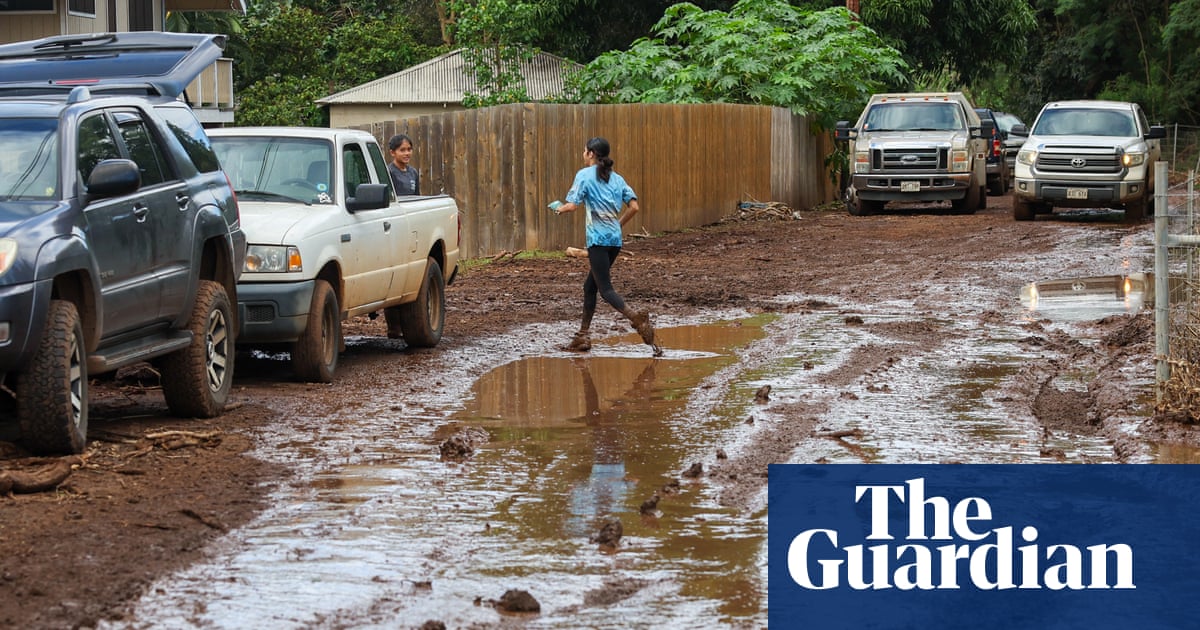Red volcanic mud coats homes after Hawaii’s worst floods in 20 years | Hawaii