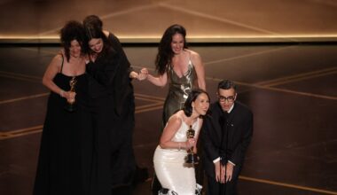 Rare Oscars tie goes to best live-action short film winners 'The Singers,' 'Two People Exchanging Saliva'