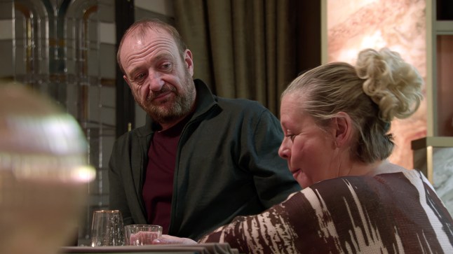 Mal Roper staring at Bernie Winter during a conversation in Coronation Street.