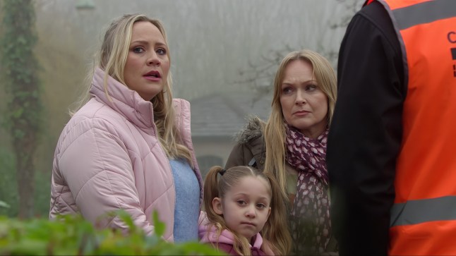 Tracy, Vanessa, Billy and Frankie standing in the Emmerdale village