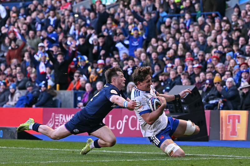 French flanker Oscar Jegou scores in the corner during the Six Nations match against Scotland at Murrayfield. Photograph: Paul Ellis/AFP via Getty Images
