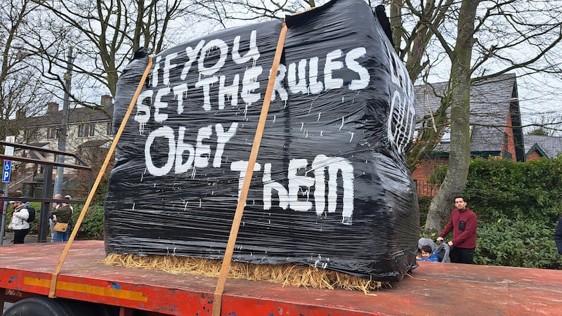 Members of the Irish Farmers' Association  protest outside Minister for Agriculture Martin Heydon's constituency office in Newbridge, Co Kildare, on Saturday. Photograph: IFA/PA Wire 
