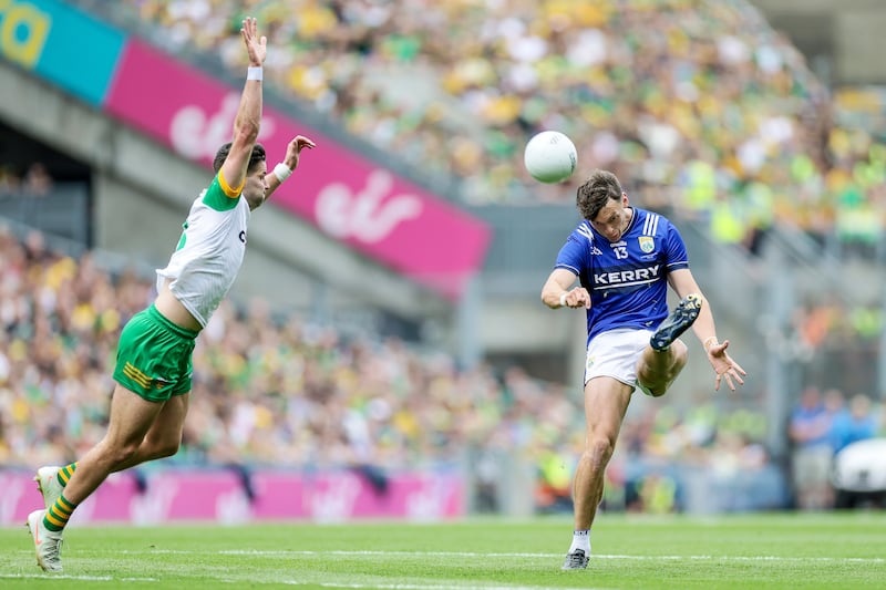 Kerry's David Clifford scores a two-pointer despite the best efforts of Donegal's Brendan McCole during last year's All-Ireland final. Photograph: Laszlo Geczo/Inpho