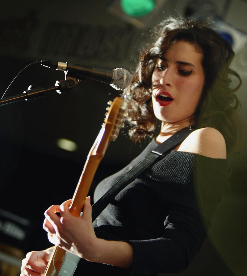 Youthful, untarnished panache: Amy Winehouse in 2004. Photograph: Bruno Vincent/Getty


