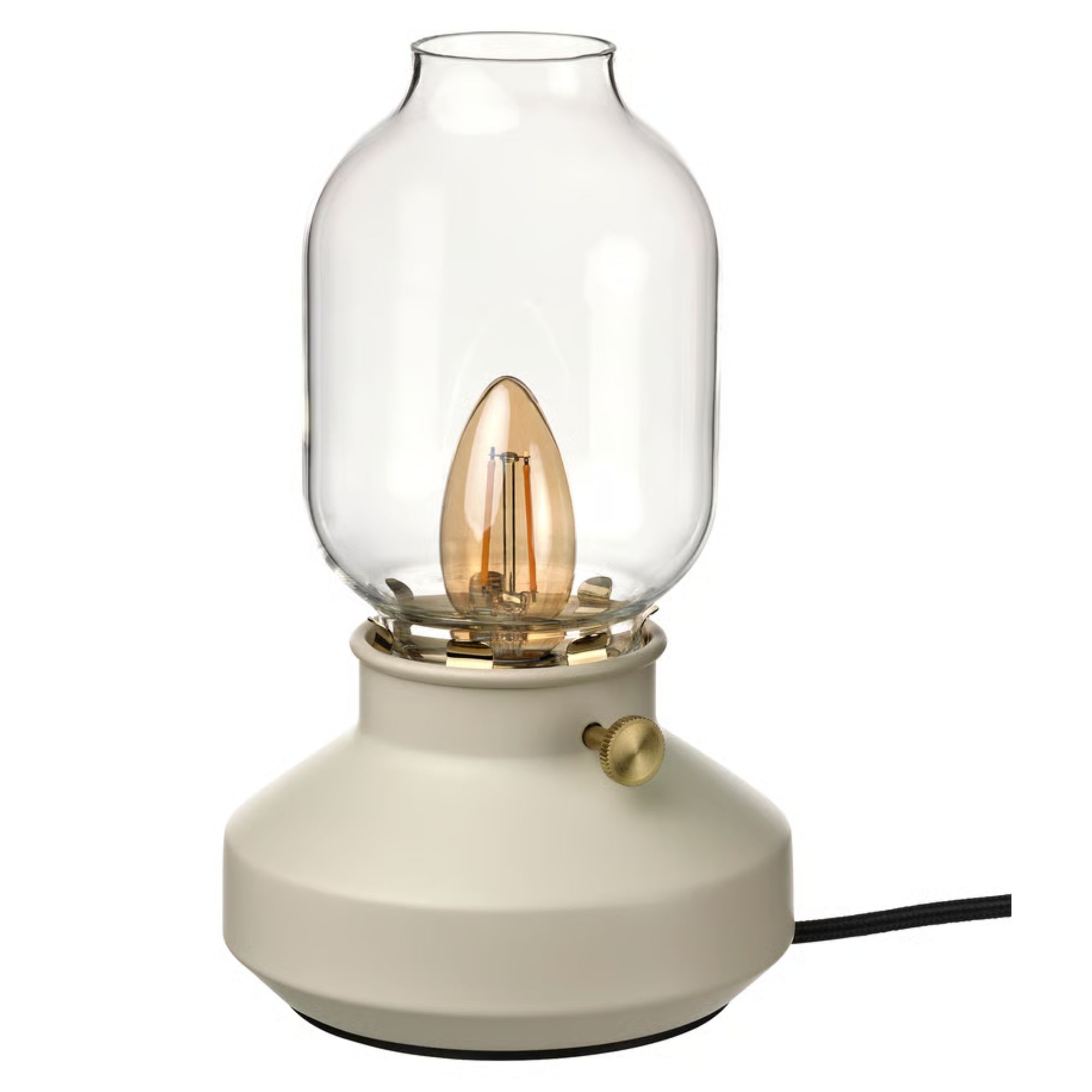 A cream colored IKEA T&Auml;RNABY dimmable table lamp
