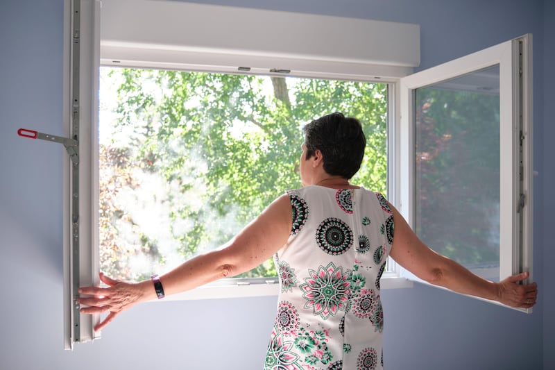 This is a generic photo of a middle-aged woman looking out of her bedroom window. See PA Feature HEALTH Hayfeveradvice. WARNING: This picture must only be used to accompany PA feature HEALTH Hayfeveradvice. PA Photo. Picture credit should read: Alamy/PA. 

NOTE TO EDITORS: This picture must only be used to accompany HEALTH Hayfeveradvice.