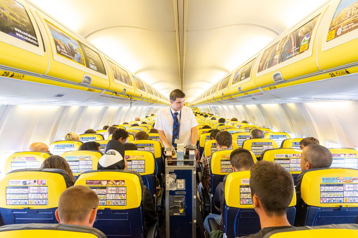 Trolley service on board a Ryanair flight, England, UK. (Photo by: Alex Segre/UCG/Universal Images Group via Getty Images)