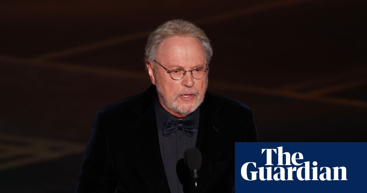 ‘What fun we had storming the castle’: Billy Crystal pays tribute to Rob Reiner at the Oscars | Oscars 2026