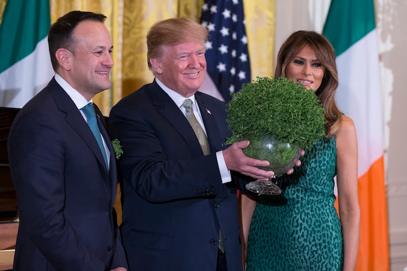 Then-taoiseach Leo Varadkar, US president Donald Trump and first lady Melania Trump pose during the shamrock ceremony at the White House on March 15th, 2018. Photograph: Alex Edelman/Getty Images
