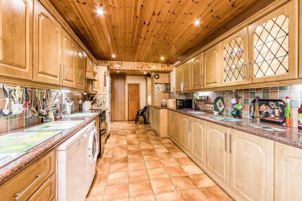 The property has a well-appointed kitchen with plenty of storage.