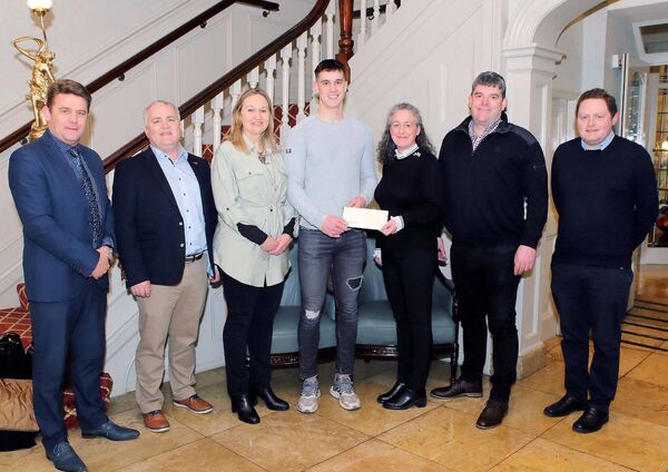 Waterford and Abbeyside's Michael Kiely was the February joint winner winner of the WLR/Granville Hotel Monthly GAA Award 2022 and he is pictured receiving his prize from Jackie Cusack, Granville Hotel and Neil Gough, WLR, also included were Waterford Co.GAA Board chairman, Séan Michael O'Regan, Award judge, Tomás McCarthy and Michael's parents, Dolores and the late Benny Kiely. Photos: Noel Browne
