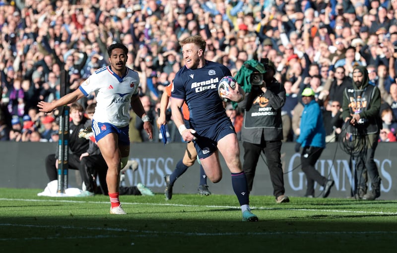 Kyle Steyn runs in Scotland's fifth try during the Six nations game against France at Murrayfield. Photograph: Ian MacNicol/Getty Images