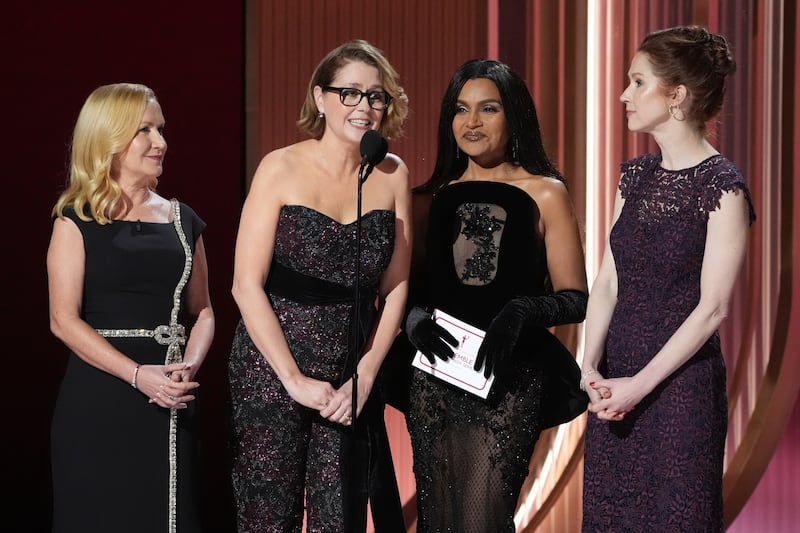 Angela Kinsey, from left, Jenna Fischer, Mindy Kaling, and Ellie Kemper present the award for outstanding performance by an ensemble in a comedy series (Chris Pizzello/AP)