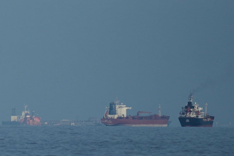 Oil tankers and cargo ships line up in the Strait of Hormuz on Thursday. Photograph: Altaf Qadri/AP