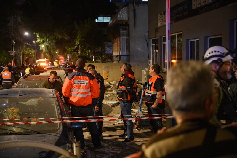 Emergency workers respond to a ballistic missile attack in the Tel Aviv suburb of Ramat Gan, Israel. Photograph: Alexi J Rosenfeld/Getty Images