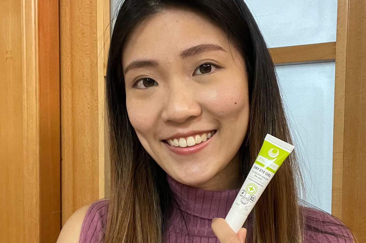 A girl holding the Hydrosil Dry Eye Gel 