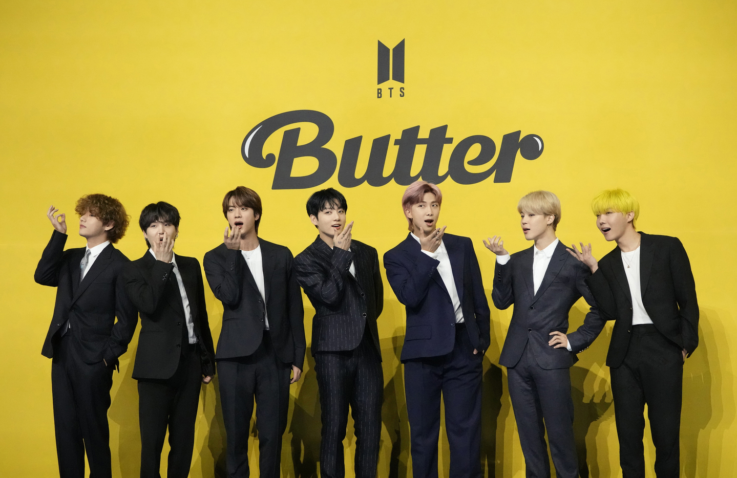 BTS members pose for photos ahead of a press conference to introduce its new single ″Butter″ in Seoul on May 21, 2021. [AP/YONHAP] 