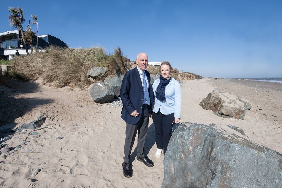 Billy Kelly and Cllr Lisa McDonald at the back of Kelly's Hotel where the erosion is evident.  Photo: Jim Campbell


