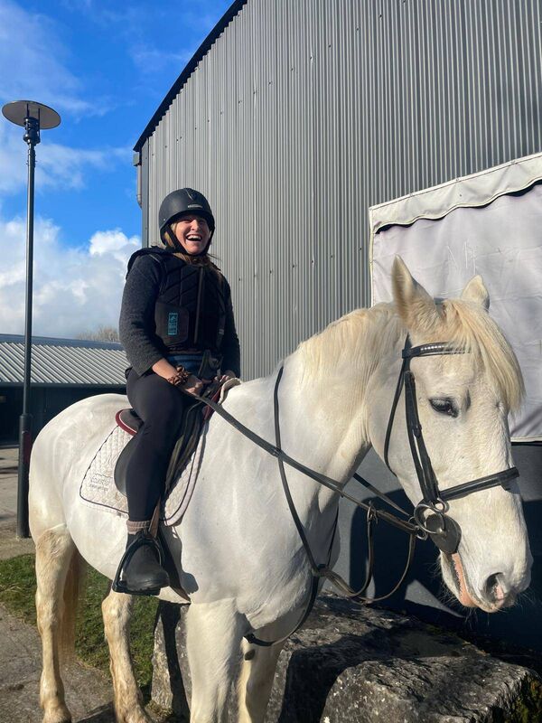 Mimi Murray with Maggie, a beautiful 21-year-old grey Irish draught horse. 