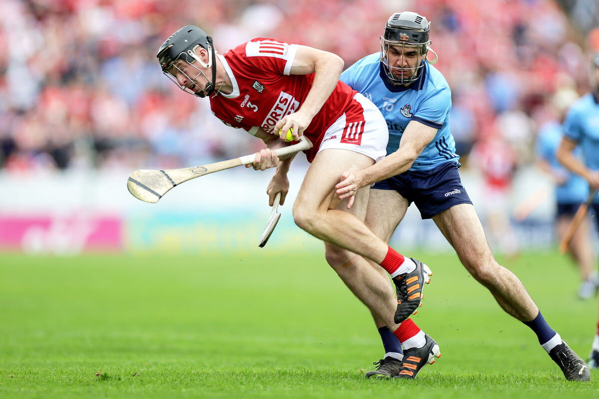 Cork's Eoin Downey and Danny Sutcliffe of Dublin in action in the 2024 All-Ireland quarter-final in Thurles. Picture: INPHO/Laszlo Geczo
