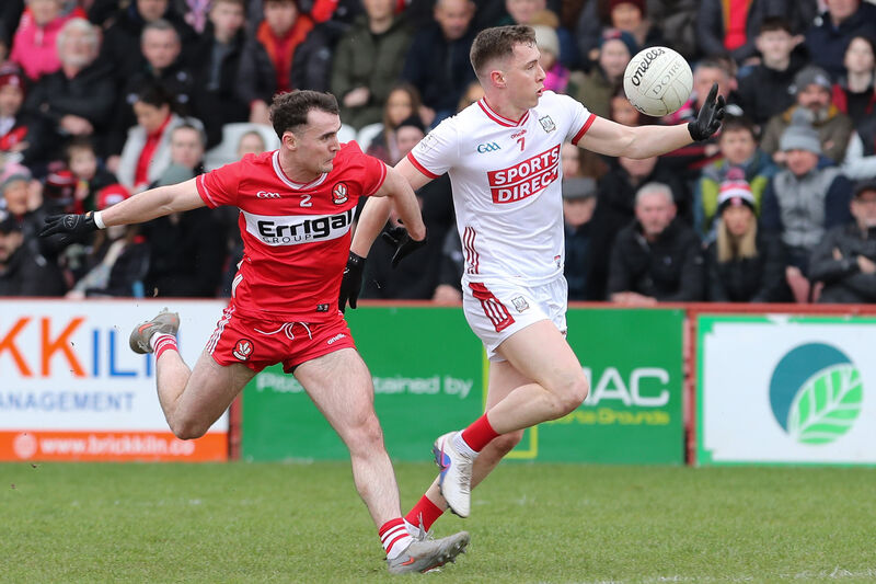 Cork’s Luke Fahy and Derry's Diarmuid Baker battle for the ball. Picture: INPHO/Lorcan Doherty