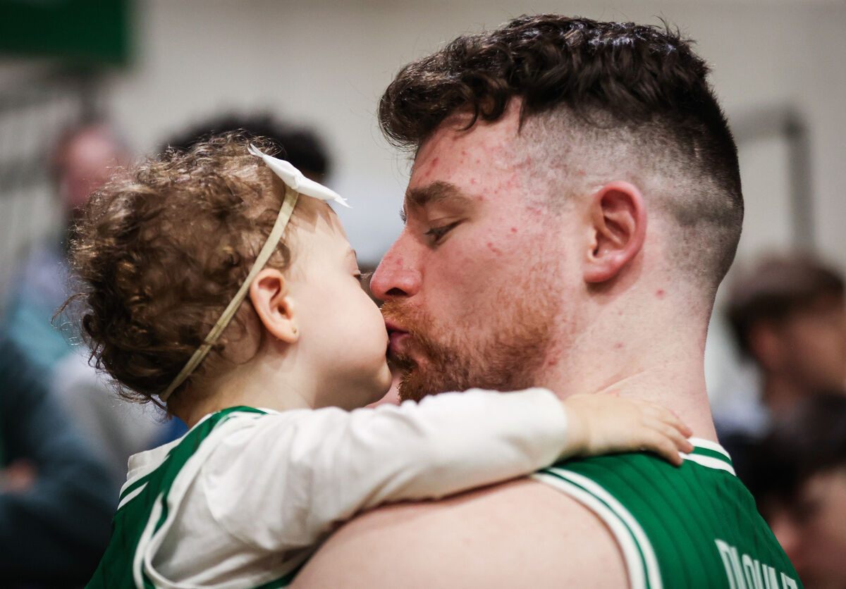 Ireland's Jordan Blount with his daughter Layla, aged 1, after winning the game. Blount announced his retirement from 5v5 international basketball before the match. Pic: ©INPHO/Tom Maher