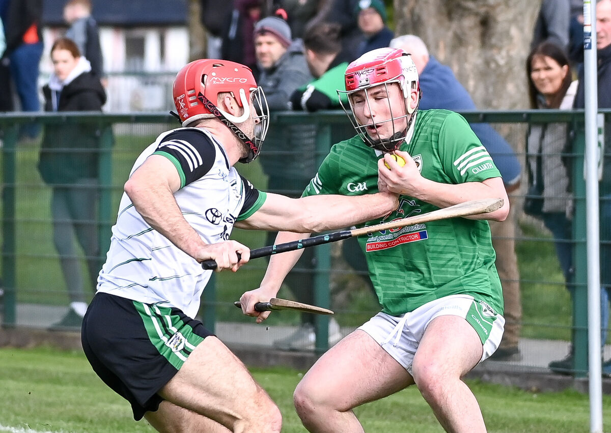  Killeagh's Colm Leahy is tackled by Douglas' Brian O'Neill in Killeagh. Picture: David Keane