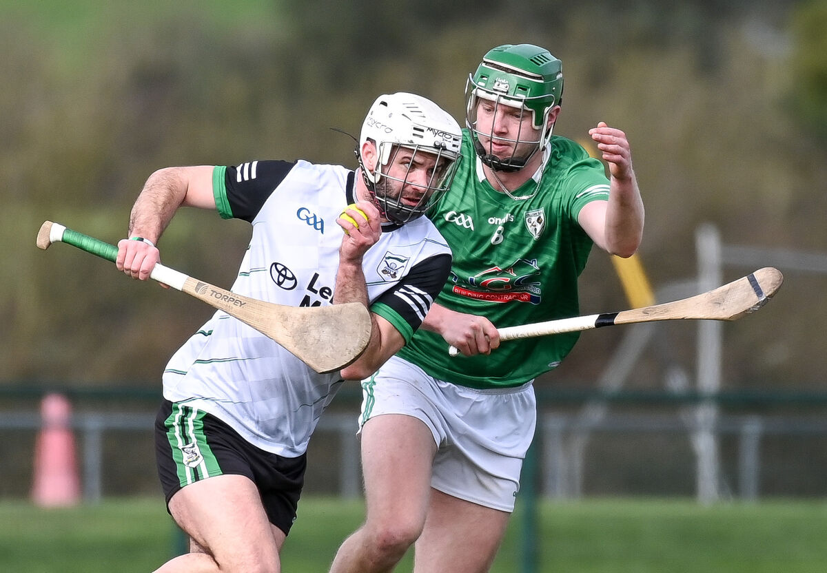  Douglas' Cian Baldwin tries to get past Killeagh's Rob Sinclair in Killeagh. Picture: David Keane