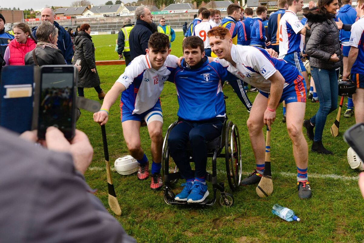 Jamie Wall with Aaron Gallagher and Cian Lynch after Mary I's 2017 Fitzgibbon Cup final win. Picture: Inpho/Tom Beary