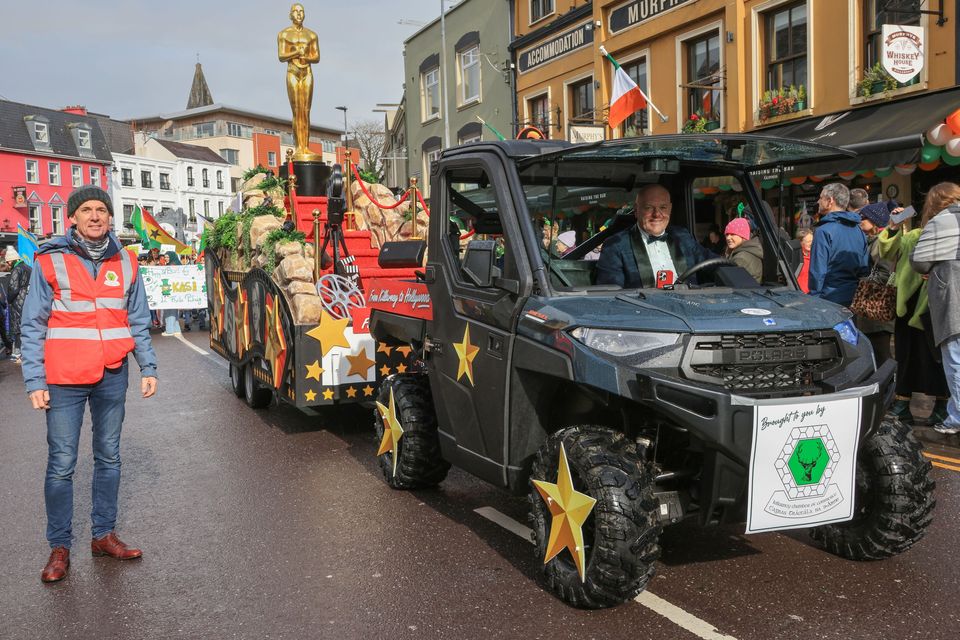 Big shout out to Oscar Winner Jessie Buckley, with Jessie's uncle and godfather, Sean Buckley, a member of the chamber standing by the float in the St Patrick's Festival Parade. The amazing Killarney Chamber of Tourism and Commerce Float also featured Killarney's Hollywood A Listers Ruairí O'Flaherty and Michael Fassbender. Photo by Valerie O'Sulllivan.