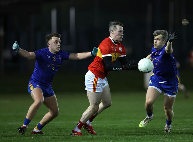  Adam Lyne and Bill O'Connell of St Finbarr's put the pressure on Mark Griffin of Éire Óg. Picture: Jim Coughlan