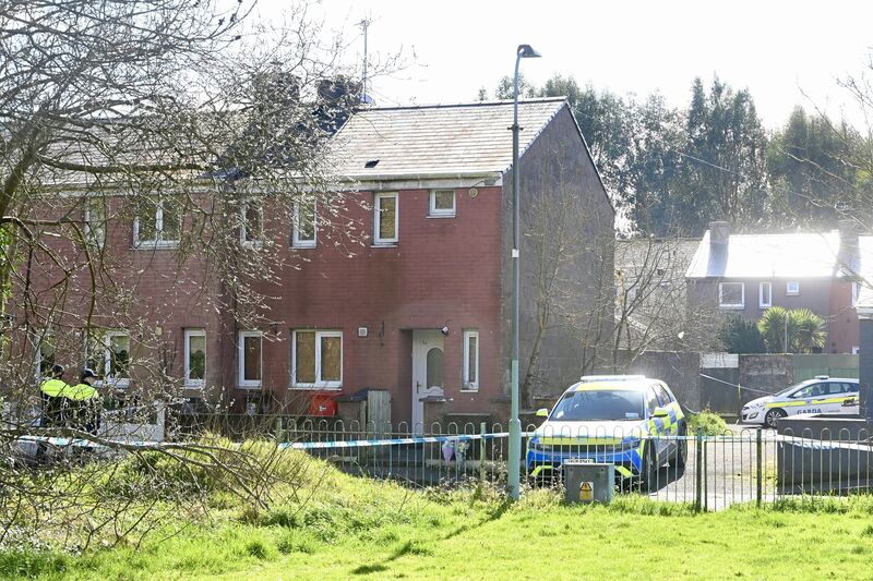 A Garda cordon remains in place at a house at Innishmore Park, Ballincollig Co Cork. Picture: Larry Cummins