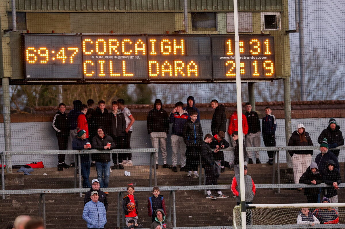 Spectators watch on under the scoreboard towards the end of the game. Picture: Michael P Ryan/Sportsfile