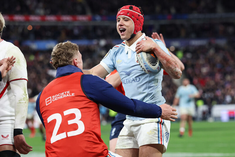 BLUE MENACE: France's Louis Bielle-Biarrey celebrates with Emilien Gailleton after he scores his sides 6th try of the match. Pic: INPHO/Billy Stickland