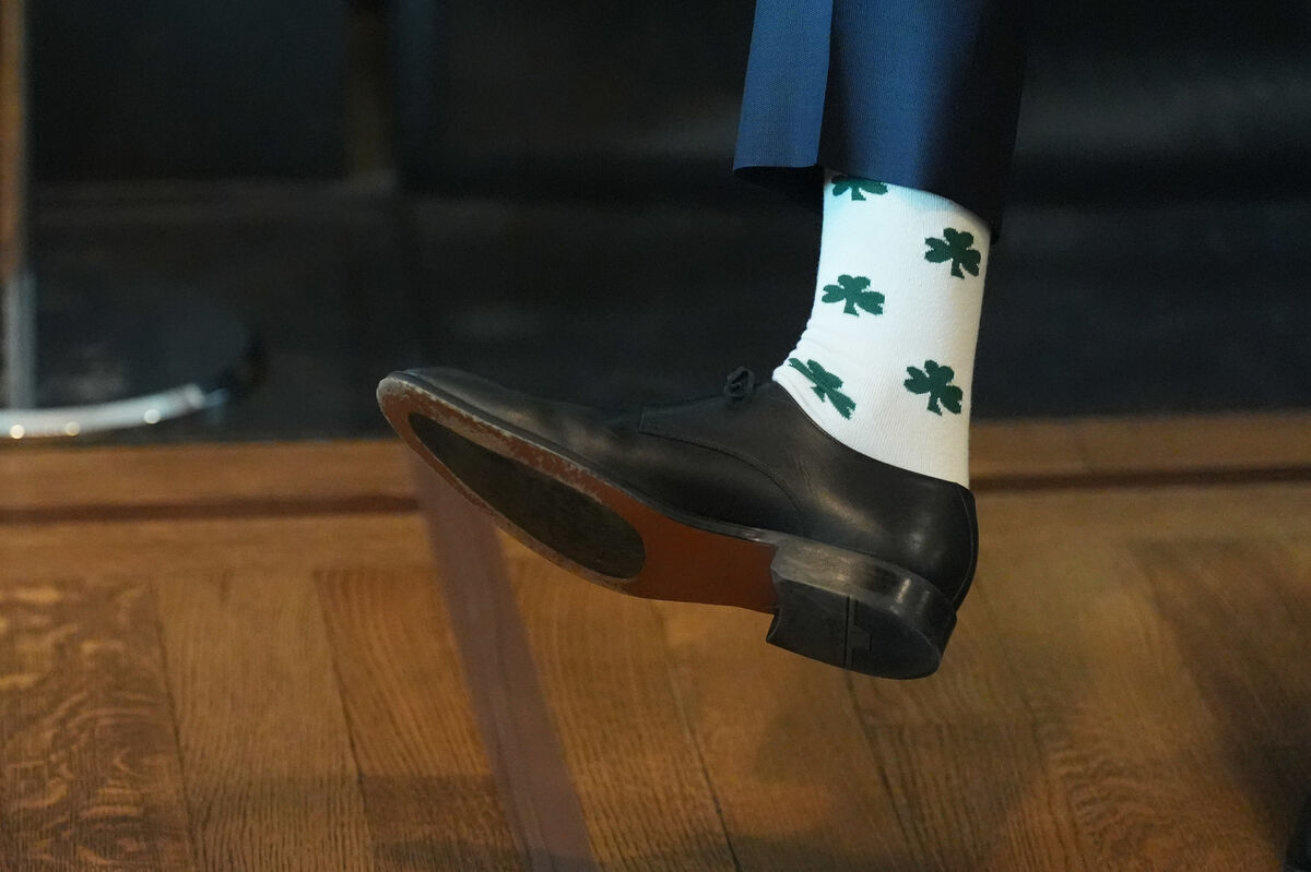 During their 2026 St Patrick's Day breakfast, JD Vance told Taoiseach Micheál Maring he was sporting 'more muted' socks than last year's hosiery selection, pictured here. File picture: Niall Carson/PA