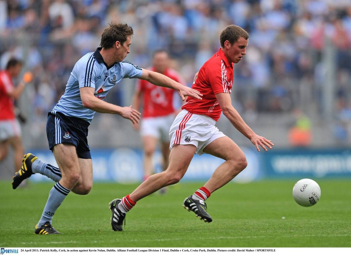 Patrick Kelly, Cork, in action against Kevin Nolan, Dublin, in the 2011 Allianz Football League Division 1 final at Croke Park. Picture: David Maher/SPORTSFILE